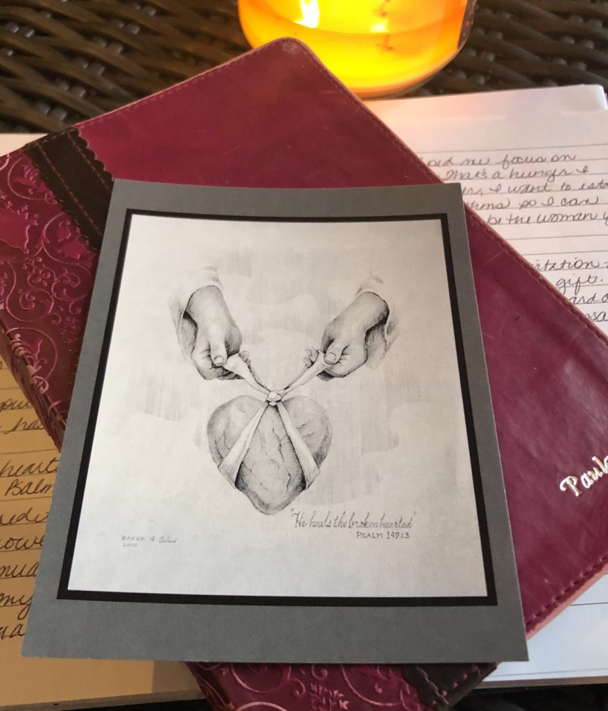 Bible, Journal and drawing of a mended heart
